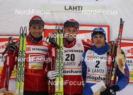 07.03.2009, Lahti, Finland (FIN): podium, l-r Ola Vigen Hattestad (NOR), Fischer, Rottefella, Swix, Petter Northug (NOR), Fischer, Rottefella, Alpina, Ski Go, Swix, Nikolay Morilov (RUS), Madshus, Rottefella, adidas  - FIS world cup cross-country, individual sprint, Lahti (FIN). www.nordicfocus.com. © Hemmersbach/NordicFocus. Every downloaded picture is fee-liable.