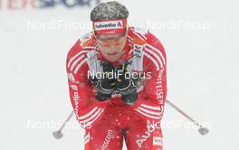 20.02.2009, Liberec, Czech Republic (CZE): Dario Cologna (SUI), Fischer, Rottefella, Alpina, Swix, adidas  - FIS nordic world ski championships, cross-country, 15km men, Liberec (CZE). www.nordicfocus.com. © Domanski/NordicFocus. Every downloaded picture is fee-liable.