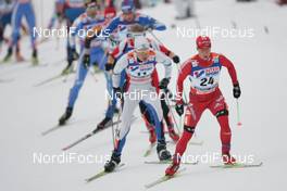 01.03.2009, Liberec, Czech Republic (CZE): group , in front Remo Fischer (SUI), Fischer, Rottefella, Alpina, KV+, adidas , behind Aivar Rehemaa (EST), Fischer, Salomon, Swix  - FIS nordic world ski championships, cross-country, mass men, Liberec (CZE). www.nordicfocus.com. © Domanski/NordicFocus. Every downloaded picture is fee-liable.