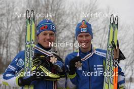 28.02.2009, Liberec, Czech Republic (CZE): group, l-r Sami Jauhojaervi (FIN), Fischer, Rottefella, Swix, Matti Heikkinen (FIN), Fischer, Rottefella, Alpina, Exel  - FIS nordic world ski championships, cross-country, medals, Liberec (CZE). www.nordicfocus.com. © Hemmersbach/NordicFocus. Every downloaded picture is fee-liable.