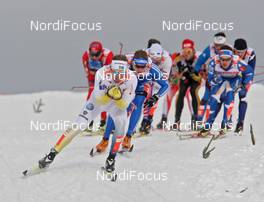 25.02.2009, Liberec, Czech Republic (CZE): group, in front Emil Joensson (SWE), Fischer, Salomon, Craft, behind Andrey Parfenov (RUS), Fischer, Rottefella, Alpina, Swix, topshot - FIS nordic world ski championships, cross-country, team sprint, Liberec (CZE). www.nordicfocus.com. © Hemmersbach/NordicFocus. Every downloaded picture is fee-liable.
