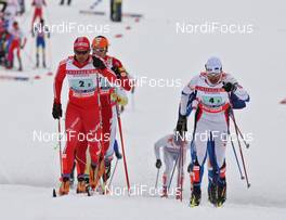 25.02.2009, Liberec, Czech Republic (CZE): group, l-r Christoph Eigenmann (SUI), Rossignol, Rottefella, Exel, adidas, Toko, Andrus Veerpalu (EST), Fischer, Salomon, Swix  - FIS nordic world ski championships, cross-country, team sprint, Liberec (CZE). www.nordicfocus.com. © Hemmersbach/NordicFocus. Every downloaded picture is fee-liable.