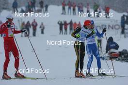 22.11.2009, Beitostoelen, Norway (NOR): Petter Northug (NOR), Fischer, Rottefella, Alpina, Ski Go, Swix , Tobias Angerer (GER), Rossignol, Rottefella, One Way, adidas, Ilia Chernousov (RUS), Fischer, Salomon, Swix, adidas - FIS world cup cross country, 4x10km men, Beitostoelen (NOR). www.nordicfocus.com. © NordicFocus. Every downloaded picture is fee-liable.