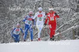 22.11.2009, Beitostoelen, Norway (NOR): Therese Johaug (NOR), Fischer, Salomon, Swix leads Sara Lindborg (SWE), Madshus, Rottefella, Alpina, Star, Craft and Alena Sidko (RUS), Madshus, Rottefella, adidas - FIS world cup cross country, 4x5km women, Beitostoelen (NOR). www.nordicfocus.com. © NordicFocus. Every downloaded picture is fee-liable.