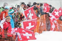 12.12.2009, Davos, Switzerland (SUI): feature, spectators with swiss flags - FIS world cup cross-country, 15km men, Davos (SUI). www.nordicfocus.com. © Hemmersbach/NordicFocus. Every downloaded picture is fee-liable.