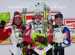 13.12.2009, Davos, Switzerland (SUI): podium, l-r Marit Bjoergen (NOR), Fischer, Rottefella, Swix, Petra Majdic (SLO), Fischer, Rottefella, Alpina, One Way, Aino Kaisa Saarinen (FIN), Rossignol, Rottefella, One Way  - FIS world cup cross-country, individual sprint, Davos (SUI). www.nordicfocus.com. © Hemmersbach/NordicFocus. Every downloaded picture is fee-liable.