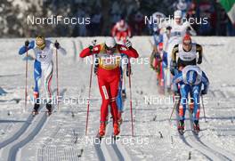 20.12.2009, Rogla, Slovenia (SLO): final sprint, in front Petter Northug (NOR), Fischer, Rottefella, Alpina, Ski Go, Swix, right behind Alexander Legkov (RUS), Madshus, Rottefella, Swix, adidas  - FIS world cup cross-country, 30km men, mass start, Rogla (SLO). www.nordicfocus.com. © Hemmersbach/NordicFocus. Every downloaded picture is fee-liable.