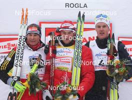 19.12.2009, Rogla, Slovenia (SLO): podium, l-r: Tobias Angerer (GER), Rossignol, Rottefella, One Way, adidas, Petter Northug (NOR), Fischer, Rottefella, Alpina, Ski Go, Swix, Jesper Modin (SWE)  - FIS world cup cross-country, individual sprint, Rogla (SLO). www.nordicfocus.com. © Hemmersbach/NordicFocus. Every downloaded picture is fee-liable.