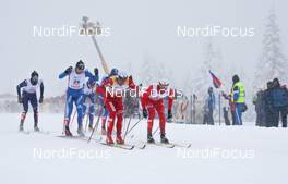 19.12.2009, Rogla, Slovenia (SLO): group, in front l-r: Petter Northug (NOR), Fischer, Rottefella, Alpina, Ski Go, Swix and Maciej Kreczmer (POL), Fischer, Salomon, Swix   - FIS world cup cross-country, individual sprint, Rogla (SLO). www.nordicfocus.com. © Hemmersbach/NordicFocus. Every downloaded picture is fee-liable.