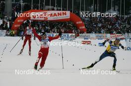 07.03.2009, Lahti, Finland (FIN): photo finish, group, l-r Magnus Moan (NOR), Madshus, Rottefella, Anssi Koivuranta (FIN), Fischer, Rottefella, Exel and in the background Bill Demong (USA), Atomic  - FIS world cup nordic combined, individual gundersen HS130/10km, Lahti (FIN). www.nordicfocus.com. © Hemmersbach/NordicFocus. Every downloaded picture is fee-liable.