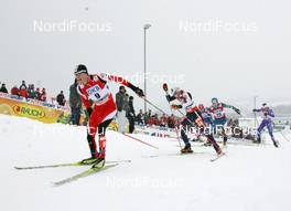 19.02.2009, Liberec, Czech Republic (CZE): group, l-r Bernhard Gruber (AUT), Fischer, Rottefella, Lukas Runggaldier (ITA) - FIS nordic world ski championships, nordic combined, mass HS100/10km, Liberec (CZE). www.nordicfocus.com. © Hemmersbach/NordicFocus. Every downloaded picture is fee-liable.