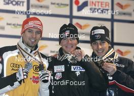 28.02.2009, Liberec, Czech Republic (CZE): l-r: Bjoern Kircheisen (GER), Fischer, Rottefella, Bill Demong (USA), Atomic, Jason Lamy-Chappuis (FRA), Fischer, Rottefella - FIS nordic world ski championships, nordic combined, medals, Liberec (CZE). www.nordicfocus.com. © Furtner/NordicFocus. Every downloaded picture is fee-liable.