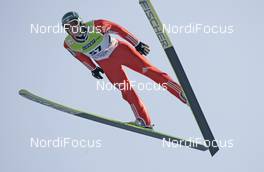 03.01.2009, Innsbruck, Austria (AUT): Dimitry Vassiliev (RUS), Fischer, adidas  - FIS world cup ski jumping, four hills tournament, individual HS130, Innsbruck (AUT). www.nordicfocus.com. © Furtner/NordicFocus. Every downloaded picture is fee-liable.