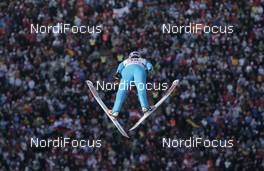 04.01.2009, Innsbruck, Austria (AUT): Martin Schmitt (GER), Atomic  - FIS world cup ski jumping, four hills tournament, individual HS130, Innsbruck (AUT). www.nordicfocus.com. © Furtner/NordicFocus. Every downloaded picture is fee-liable.