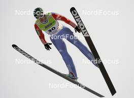 03.01.2009, Innsbruck, Austria (AUT): Ilja Rosliakov (RUS), Atomic  - FIS world cup ski jumping, four hills tournament, individual HS130, Innsbruck (AUT). www.nordicfocus.com. © Furtner/NordicFocus. Every downloaded picture is fee-liable.