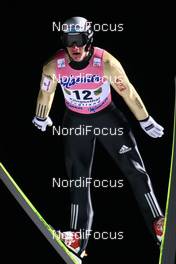 11.02.2009, Klingenthal, Germany (GER): Nikolay Karpenko (KAZ), Fischer - FIS world cup ski jumping, individual HS140, Klingenthal (GER). www.nordicfocus.com. © Lange/NordicFocus. Every downloaded picture is fee-liable.