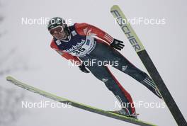 14.02.2009, Oberstdorf, Germany (GER): Dimitry Vassiliev (RUS), Fischer, adidas  - FIS world cup ski jumping, individual HS213, Oberstdorf (GER). www.nordicfocus.com. © Furtner/NordicFocus. Every downloaded picture is fee-liable.