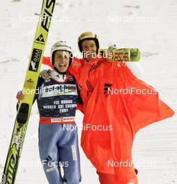 27.02.2009, Liberec, Czech Republic (CZE): l-r: Simon Ammann (SUI), Fischer, adidas, Andreas Kuettel (SUI), Fischer, adidas - FIS nordic world ski championships, ski jumping, individual HS134, Liberec (CZE). www.nordicfocus.com. © Furtner/NordicFocus. Every downloaded picture is fee-liable.