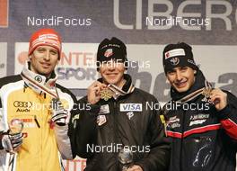 28.02.2009, Liberec, Czech Republic (CZE): l-r: Bjoern Kircheisen (GER), Fischer, Rottefella, Bill Demong (USA), Atomic, Jason Lamy-Chappuis (FRA), Fischer, Rottefella - FIS nordic world ski championships, nordic combined, medals, Liberec (CZE). www.nordicfocus.com. © Furtner/NordicFocus. Every downloaded picture is fee-liable.