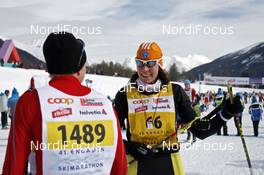 08.03.2009, Scuol, Switzerland (SUI): happy faces at finish - Worldloppet FMC, Engadin, Scuol (SUI). www.nordicfocus.com. © Felgenhauer/NordicFocus. Every downloaded picture is fee-liable.
