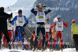 08.03.2009, Scuol, Switzerland (SUI): drinking - Worldloppet FMC, Engadin, Scuol (SUI). www.nordicfocus.com. © Felgenhauer/NordicFocus. Every downloaded picture is fee-liable.