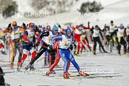 08.03.2009, Scuol, Switzerland (SUI): the men's start with Daniel Tynell (SWE), Salomon, One Way, Star Sergey Shiriaev (RUS), Fischer, Alpina, Swix, adidas, Rudy Project   - Worldloppet FMC, Engadin, Scuol (SUI). www.nordicfocus.com. © Felgenhauer/NordicFocus. Every downloaded picture is fee-liable.