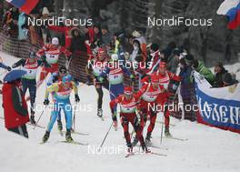 10.01.2010, Oberhof, Germany (GER): Andriy Deryzemlya (UKR), Fischer, Rottefella, Swix, Ole Einar Bjoerndalen (NOR), Madshus, Rottefella, Odlo, Klemen Bauer (SLO), Fischer, Lars Berger (NOR), Madshus, Rottefella, Odlo, Alexander Os (NOR), Fischer, Rottefella, Swix, Odlo - IBU world cup biathlon, mass men, Oberhof (GER). www.nordicfocus.com. © Manzoni/NordicFocus. Every downloaded picture is fee-liable.