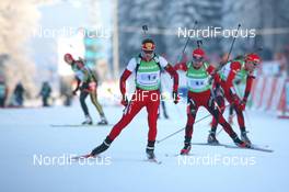 07.01.2010, Oberhof, Germany (GER): Christoph Sumann (AUT), Atomic, Leki  leads Ole Einar Bjoerndalen (NOR), Madshus, Rottefella, Odlo - IBU world cup biathlon, relay men, Oberhof (GER). www.nordicfocus.com. © Manzoni/NordicFocus. Every downloaded picture is fee-liable.