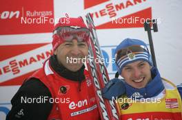 09.01.2010, Oberhof, Germany (GER): Ole Einar Bjoerndalen (NOR), Madshus, Rottefella, Odlo, Evgeny Ustyugov (RUS), Madshus, Rottefella, Swix, adidas  - IBU world cup biathlon, sprint men, Oberhof (GER). www.nordicfocus.com. © Trienitz/NordicFocus. Every downloaded picture is fee-liable.