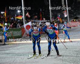 15.01.2010, Ruhpolding, Germany (GER): l-r: Julie Carraz-Collin (FRA), Fischer, Exel, Odlo, Anais Bescond (FRA), Madshus, Rottefella, Odlo  - IBU world cup biathlon, relay women, Ruhpolding (GER). www.nordicfocus.com. © Felgenhauer/NordicFocus. Every downloaded picture is fee-liable.