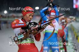 15.01.2010, Ruhpolding, Germany (GER): Chunli Wang (CHN), Fischer, Salomon, adidas  - IBU world cup biathlon, relay women, Ruhpolding (GER). www.nordicfocus.com. © Felgenhauer/NordicFocus. Every downloaded picture is fee-liable.