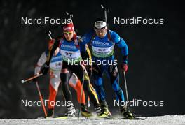 14.01.2010, Ruhpolding, Germany (GER): Simon Fourcade (FRA), Rossignol, Rottefella, Odlo, leading a group - IBU world cup biathlon, sprint men, Ruhpolding (GER). www.nordicfocus.com. © Felgenhauer/NordicFocus. Every downloaded picture is fee-liable.