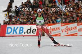 24.01.2010, Antholz, Italy (ITA): Zina Kocher (CAN), Atomic, Leki, Odlo - IBU world cup biathlon, pursuit women, Antholz (ITA). www.nordicfocus.com. © Manzoni/NordicFocus. Every downloaded picture is fee-liable.
