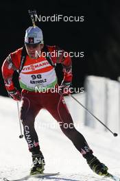 23.01.2010, Antholz, Italy (ITA): Marc-Andre Bedard (CAN), Fischer, Rottefella, Swix - IBU world cup biathlon, sprint men, Antholz (ITA). www.nordicfocus.com. © Manzoni/NordicFocus. Every downloaded picture is fee-liable.