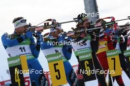 21.03.2010, Holmenkollen, Norway (NOR): Vincent Jay (FRA), Fischer, Rottefella, Simon Fourcade (FRA), Fischer, Rottefella, Swix, Odlo, Christoph Stephan (GER), Fischer, Rottefella, Alpina, Swix, adidas, Toko, Emil Hegle Svendsen (NOR), Madshus, Rottefella, Swix, Odlo - IBU world cup biathlon, mass men, Holmenkollen (NOR). www.nordicfocus.com. © Manzoni/NordicFocus. Every downloaded picture is fee-liable.