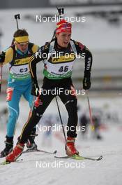18.03.2010, Holmenkollen, Norway (NOR): Simon Schempp (GER), Fischer, Rottefella, Alpina, Leki, adidas  - IBU world cup biathlon, sprint men, Holmenkollen (NOR). www.nordicfocus.com. © Manzoni/NordicFocus. Every downloaded picture is fee-liable.