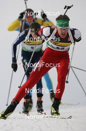 18.03.2010, Holmenkollen, Norway (NOR): Simon Eder (AUT), Fischer, Rottefella, Swix - IBU world cup biathlon, sprint men, Holmenkollen (NOR). www.nordicfocus.com. © Manzoni/NordicFocus. Every downloaded picture is fee-liable.