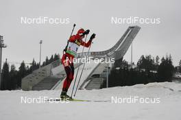 18.03.2010, Holmenkollen, Norway (NOR): Alexander Os (NOR), Fischer, Rottefella, Swix, Odlo - IBU world cup biathlon, sprint men, Holmenkollen (NOR). www.nordicfocus.com. © Manzoni/NordicFocus. Every downloaded picture is fee-liable.
