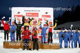 25.03.2010, Khanty-Mansiysk, Russia (RUS): All globe winners of the season 2009/10: (l-r) Christoph Sumann (AUT), Atomic, Leki , Evgeny Ustyugov (RUS), Madshus, Rottefella, Swix, adidas, Martin Fourcade (FRA), Rossignol, Rottefella, Odlo, Emil Hegle Svendsen (NOR), Madshus, Rottefella, Swix, Odlo, Magdalena Neuner (GER), Fischer, Rottefella, Exel, adidas Anna Carin Olofsson-Zidek (SWE), Madshus, Rottefella, Alpina, Leki, adidas, Simone Hauswald (GER), Fischer, Rottefella, Exel, adidas, Toko, Iana Romanova (RUS), Madshus, Rottefella, adidas, Anna Boulygina (RUS), Madshus, Rottefella, KV+, adidas, Olga Medvedtseva (RUS), Madshus, Rottefella, adidas, Svetlana Sleptsova (RUS), Fischer, Rottefella, Alpina, Swix, adidas, Olga Zaitseva (RUS), Madshus, Rottefella, Alpina, Swix, adidas, Uwe Muessiggang (GER), headcoach women Germany, Per Arne Botnan (NOR), sports director Team Norway - IBU world cup biathlon, cups, Khanty-Mansiysk (RUS). www.nordicfocus.com. © Manzoni/NordicFocus. Every downloaded picture is fee-liabl