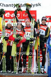28.03.2010, Khanty-Mansiysk, Russia (RUS): (L-R): Simone Hauswald (GER), Fischer, Rottefella, Exel, adidas, Toko, Magdalena Neuner (GER), Fischer, Rottefella, Exel, adidas, Simon Schempp (GER), Fischer, Rottefella, Alpina, Leki, adidas , Arnd Peiffer (GER), Fischer, Salomon, Swix, adidas - IBU world cup biathlon, relay mixed, Khanty-Mansiysk (RUS). www.nordicfocus.com. © Manzoni/NordicFocus. Every downloaded picture is fee-liable.