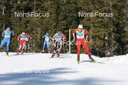 21.02.2010, Whistler, Canada (CAN): Tora Berger (NOR), Fischer, Rottefella, Odlo leads Andrea Henkel (GER), Atomic, Exel, adidas, Toko and Helena Jonsson (SWE), Fischer, Rottefella, Leki, adidas - Olympic Winter Games Vancouver 2010, biathlon, mass women, Whistler (CAN). www.nordicfocus.com. © NordicFocus. Every downloaded picture is fee-liable.