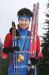 25.02.2010, Whistler, Canada (CAN): Olga Medvedtseva (RUS), Madshus, Rottefella, adidas - Olympic Winter Games Vancouver 2010, biathlon, medals, Whistler (CAN). www.nordicfocus.com. © NordicFocus. Every downloaded picture is fee-liable.
