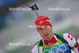 16.02.2010, Whistler, Canada (CAN): Thomas Frei (SUI), Atomic, Leki, adidas - Olympic Winter Games Vancouver 2010, biathlon, pursuit men, Whistler (CAN). www.nordicfocus.com. © NordicFocus. Every downloaded picture is fee-liable.