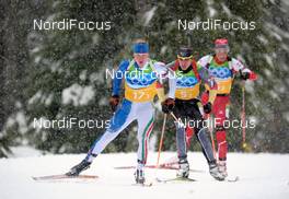26.02.2010, Whistler, Canada (CAN): l-r: Lukas Hofer (ITA), Rossignol, Exel, Arnd Peiffer (GER), Fischer, Salomon, Exel, adidas  - Olympic Winter Games Vancouver 2010, biathlon, relay men, Whistler (CAN). www.nordicfocus.com. © NordicFocus. Every downloaded picture is fee-liable.