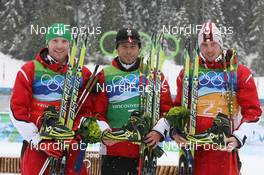 26.02.2010, Whistler, Canada (CAN): (l-r) Simon Eder (AUT), Fischer, Rottefella, Swix, Daniel Mesotitsch (AUT), Fischer, Rottefella, Leki, Dominik Landertinger (AUT), Fischer, Rottefella, Leki - Olympic Winter Games Vancouver 2010, biathlon, relay men, Whistler (CAN). www.nordicfocus.com. © NordicFocus. Every downloaded picture is fee-liable.