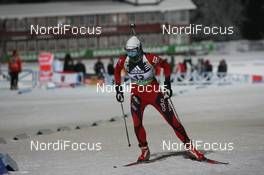 03.12.2010, Oestersund, Sweden (SWE): Ann Kristin Flatland (NOR), Madshus, Rottefella, Alpina, Swix, ODLO - IBU world cup biathlon, sprint women, Oestersund (SWE). www.nordicfocus.com. © Manzoni/NordicFocus. Every downloaded picture is fee-liable.