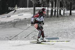 03.12.2010, Oestersund, Sweden (SWE): Ji-Hee Mun (KOR), Fischer, Salomon, Leki  - IBU world cup biathlon, sprint women, Oestersund (SWE). www.nordicfocus.com. © Manzoni/NordicFocus. Every downloaded picture is fee-liable.