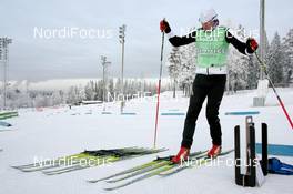03.12.2010, Oestersund, Sweden (SWE): Thomas Burmann (GER), Holmenkol technician - IBU world cup biathlon, training, Oestersund (SWE). www.nordicfocus.com. © Manzoni/NordicFocus. Every downloaded picture is fee-liable.