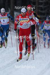02.01.2010, Oberhof, Germany (GER): Petter Northug (NOR), Fischer, Rottefella, Alpina, Ski Go, Swix, Axel Teichmann (GER), Madshus, Rottefella, Swix, adidas, Toko  - FIS world cup cross-country, tour de ski, 15km men handicap start, Oberhof (GER). www.nordicfocus.com. © Hemmersbach/NordicFocus. Every downloaded picture is fee-liable.