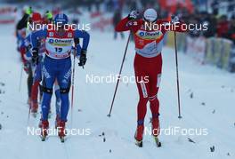 02.01.2010, Oberhof, Germany (GER): group, finish, l-r: Maxim Vylegzhanin (RUS), Fischer, Rottefella, Alpina, Swix, adidas and Petter Northug (NOR), Fischer, Rottefella, Alpina, Ski Go, Swix   - FIS world cup cross-country, tour de ski, 15km men handicap start, Oberhof (GER). www.nordicfocus.com. © Hemmersbach/NordicFocus. Every downloaded picture is fee-liable.
